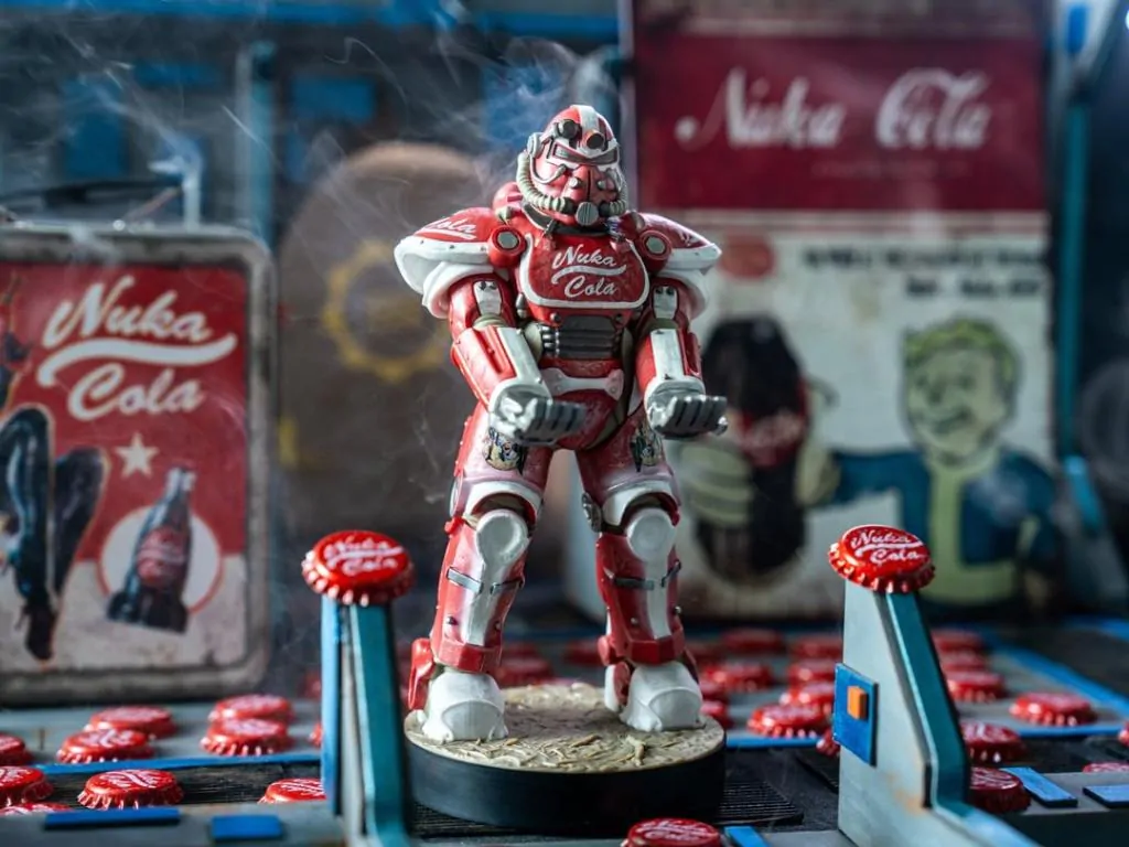Fallout Nuka Cola Pancerz Wspomagany Cable Guys Uchwyt na kontroler i Stojak na telefon zdjęcie produktu