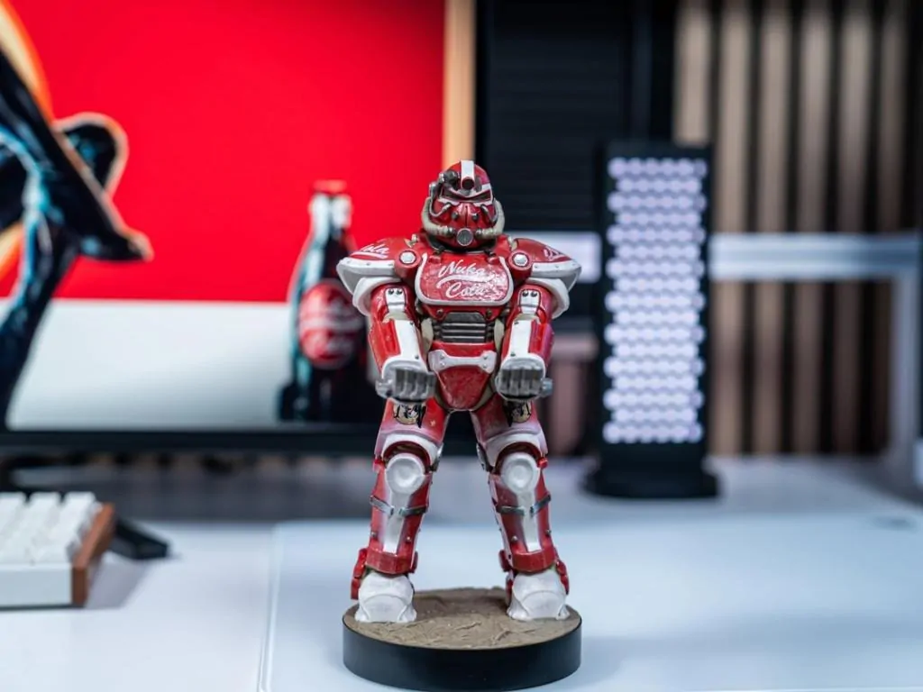 Fallout Nuka Cola Pancerz Wspomagany Cable Guys Uchwyt na kontroler i Stojak na telefon zdjęcie produktu
