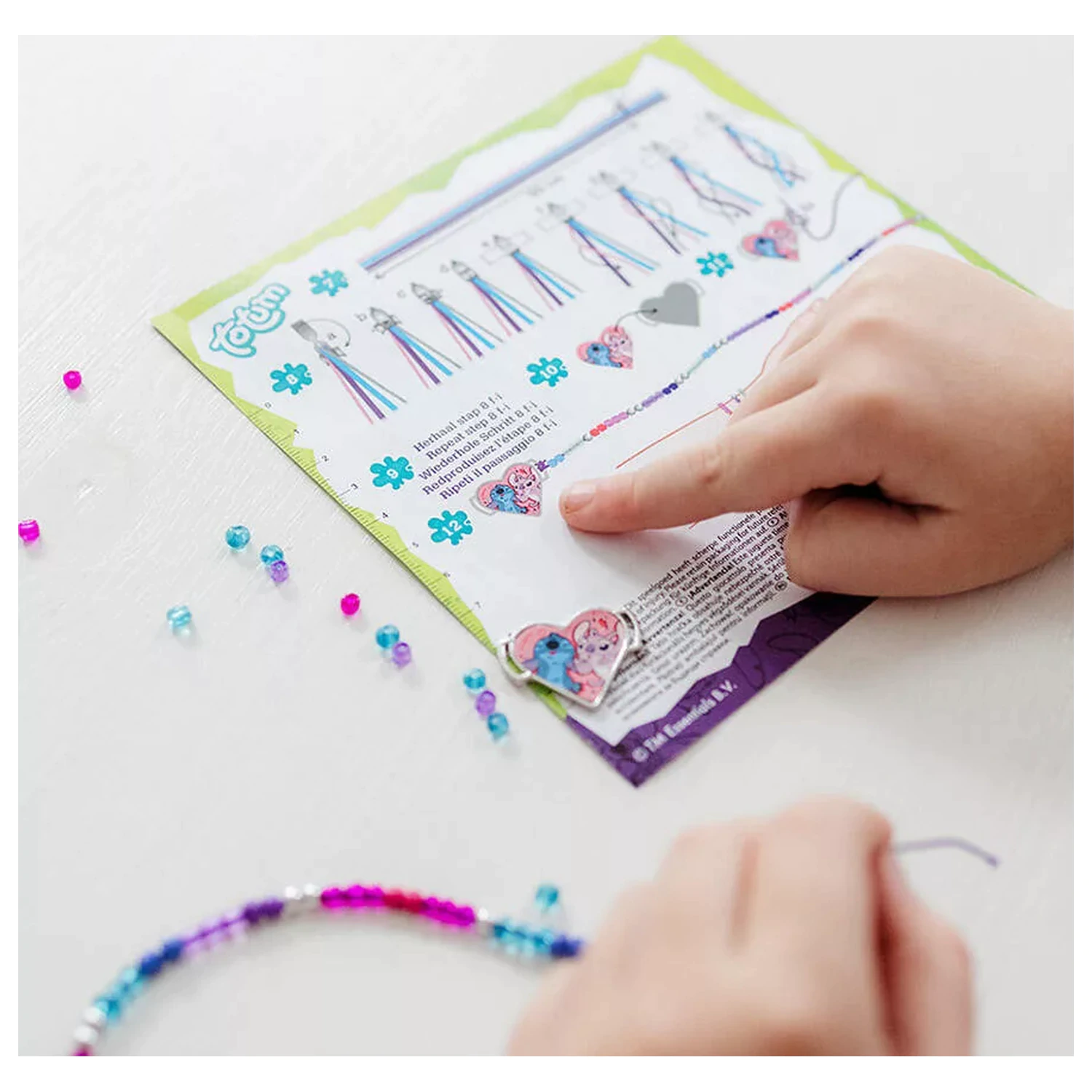 Zestaw do tworzenia fioletowej bransoletki z charmsami Stitch zdjęcie produktu